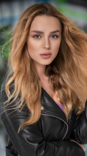 Blonde model in leather jacket