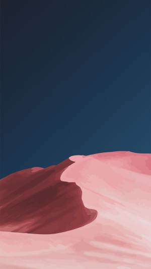 Desert dunes under a dark blue night sky