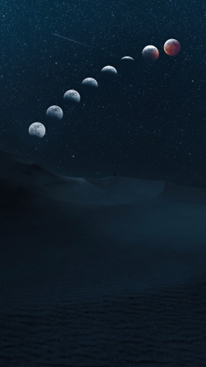 Moon phases over desert landscape at night
