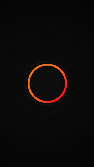 Orange and red circle on black background