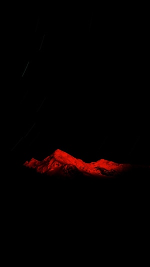 Red mountains in the dark