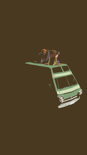 Two people on top of a green van