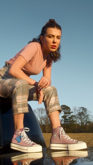Millie Bobby Brown posing outdoors