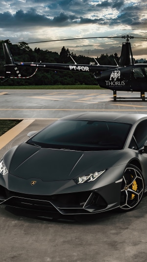 Black Lamborghini Huracan Evo and Helicopter