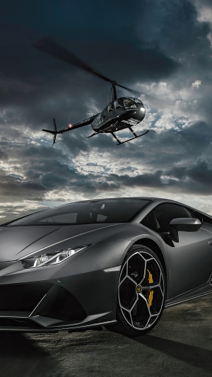 Lamborghini Huracan Evo and Helicopter in Clouds