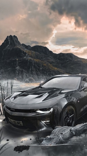 Black Chevrolet Camaro near mountains and alligator