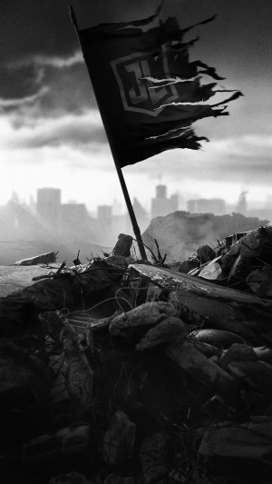 Tattered Justice League flag in ruins