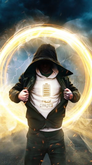 Man in hoodie with fully charged battery shirt