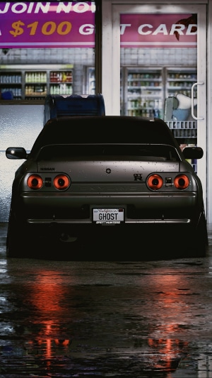 Nissan Skyline GT-R R32 in front of a store