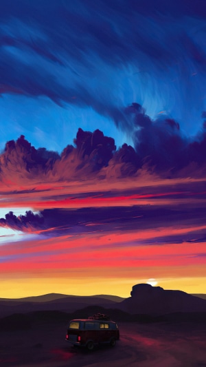 Van driving through desert at sunset