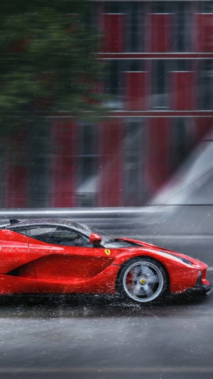 Red Ferrari LaFerrari driving in the rain 4K