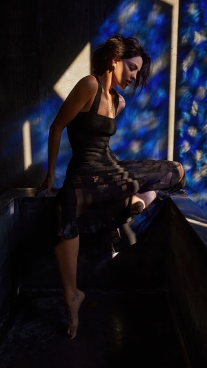 Eiza Gonzalez in black dress with blue light