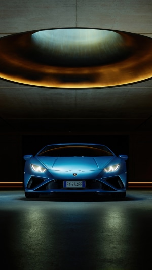 Blue Lamborghini Huracan Evo in a Modern Garage