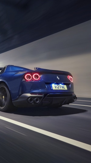 Ferrari 812 Superfast driving through a tunnel