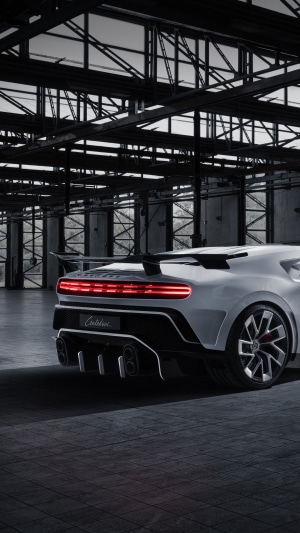 Bugatti Centodieci rear view in industrial building