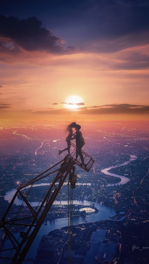 Couple kissing on a crane at sunset over city
