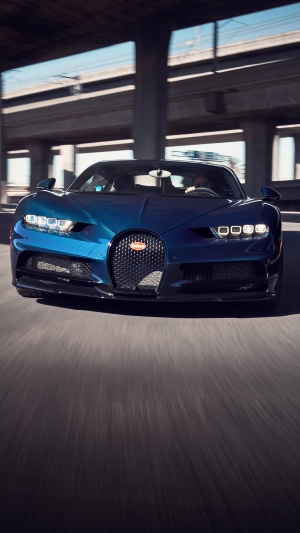 Bugatti Chiron Pur Sport driving on a road