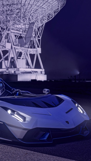 Lamborghini SC20 convertible sports car near radio telescope