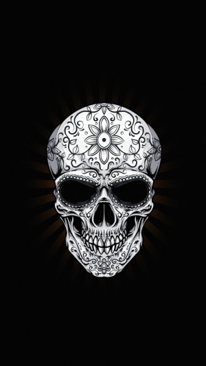 Artwork of a decorated skull with floral patterns