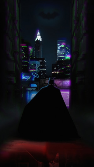 Batman in a neon-lit city at night