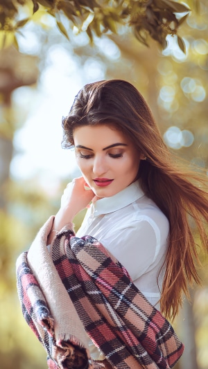 Model with scarf and white shirt in nature