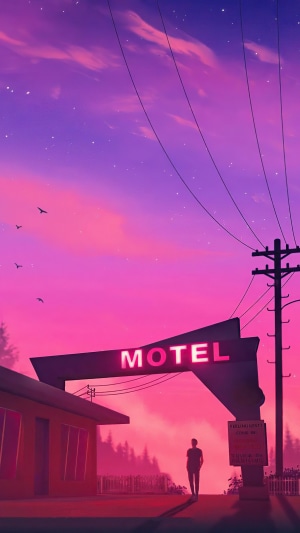 Motel sign at sunset with a lone figure