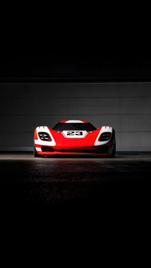 Red and white Porsche 917 race car with number 23