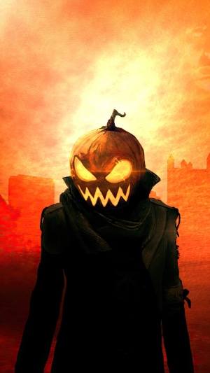 Scary Jack-o'-lantern character in dark clothing