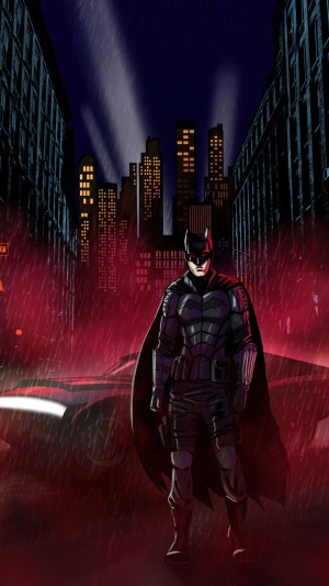 Batman in a rainy city street with his car