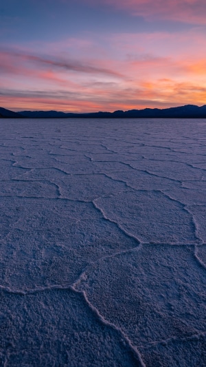 Salt flats at sunset with colorful sky