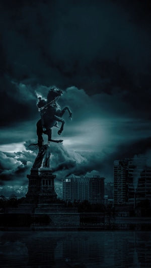 Warrior on Horse Statue with Cityscape