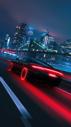 Black sports car with neon red wheels driving through city at night