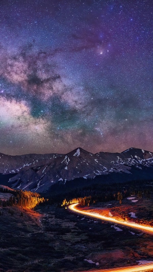 Mountain road under the Milky Way, long exposure photography 4K