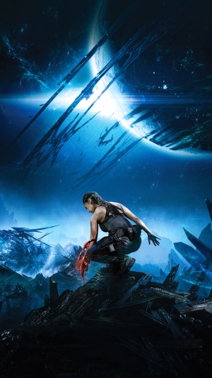 Woman with red weapon in futuristic landscape