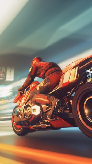 Motorcyclist in red suit on a futuristic motorcycle