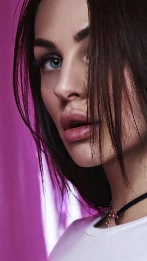 Model with dark hair and blue eyes