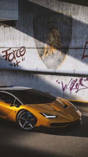 Lamborghini Centenario with graffiti wall