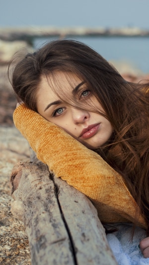 Girl with blue eyes on a beach