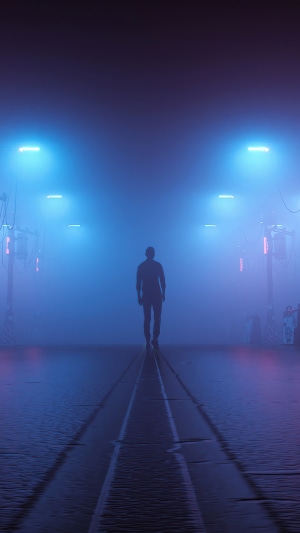 Man walking in a foggy, neon-lit corridor