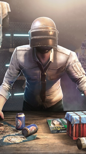 PlayerUnknown's Battlegrounds character with map and cans