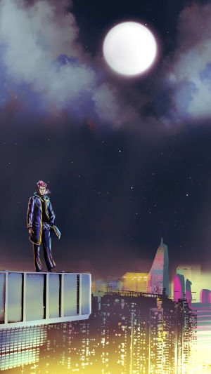 Man on rooftop overlooking city at night