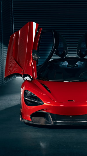 Red McLaren 720S with doors open