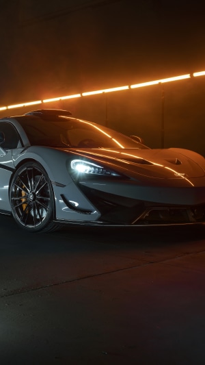 McLaren 620R sports car with orange lighting