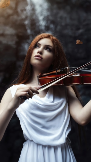 Girl playing violin with butterfly