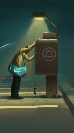 Man at a payphone under a streetlamp