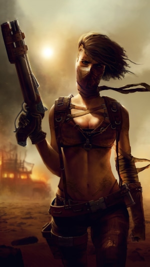 Warrior woman with a gun in a desert