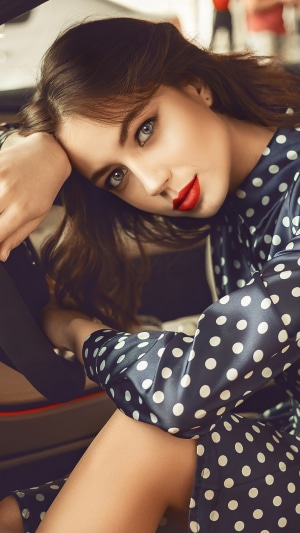 Brunette model with red lipstick