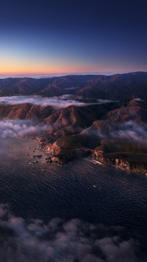 Big Sur coastline at sunrise with fog