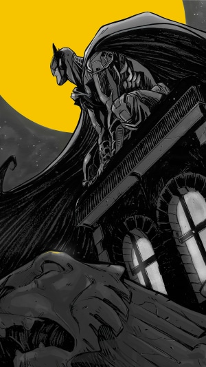 Batman sitting on a building ledge with a yellow moon