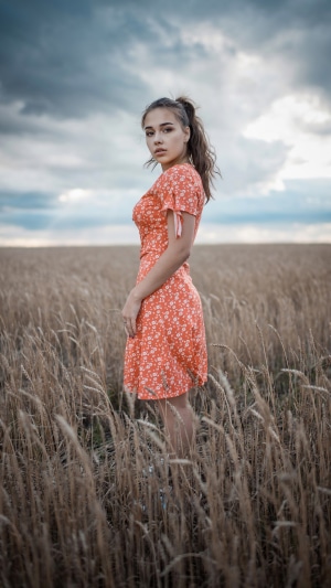 Alina Sabirova in Wheat Field at Sunset